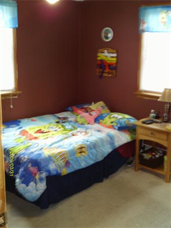 275 Andover Road Billerica, MA 01821 - Photo 21 of 26 a bedroom with a bed and a window