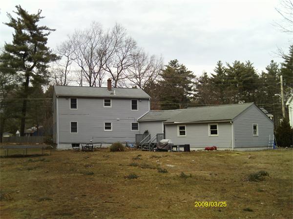 275 Andover Road Billerica, MA 01821 - Photo 26 of 26 a front view of a house with a garden