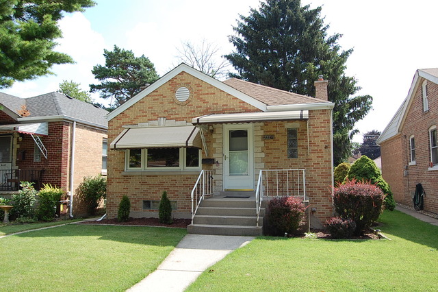 2227 Keystone Avenue North Riverside, IL 60546 - Photo 1 of 16 a front view of a house with a yard