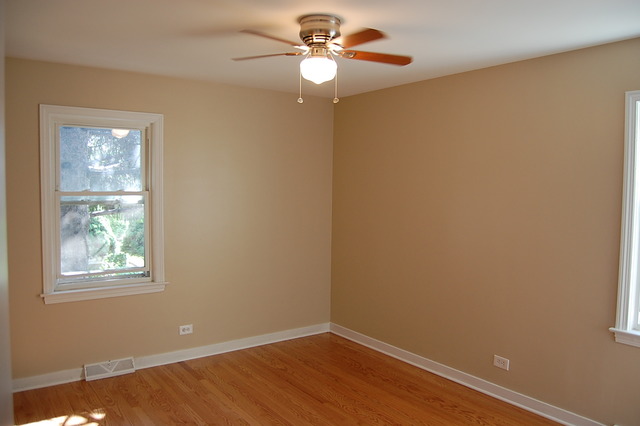 2227 Keystone Avenue North Riverside, IL 60546 - Photo 5 of 16 a view of room with window and ceiling fan