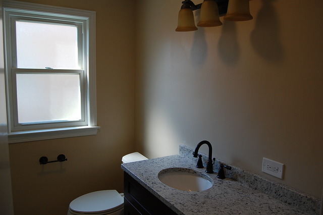 2227 Keystone Avenue North Riverside, IL 60546 - Photo 10 of 16 a bathroom with a granite countertop sink toilet and mirror