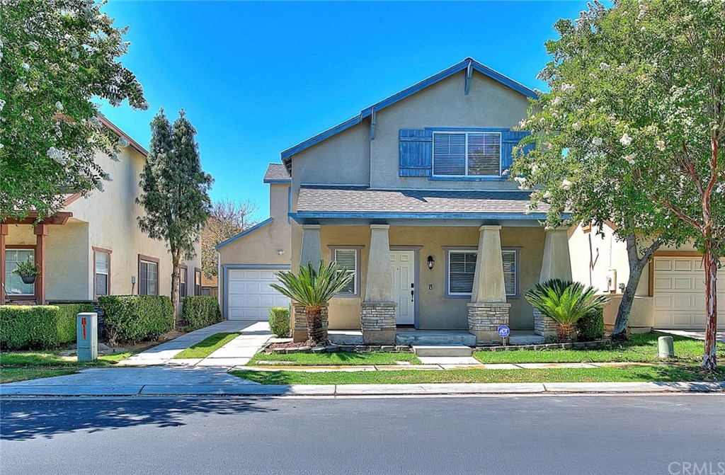 8533 Lorisa Way Riverside, CA 92504 - Photo 1 of 1 a front view of house with yard and green space