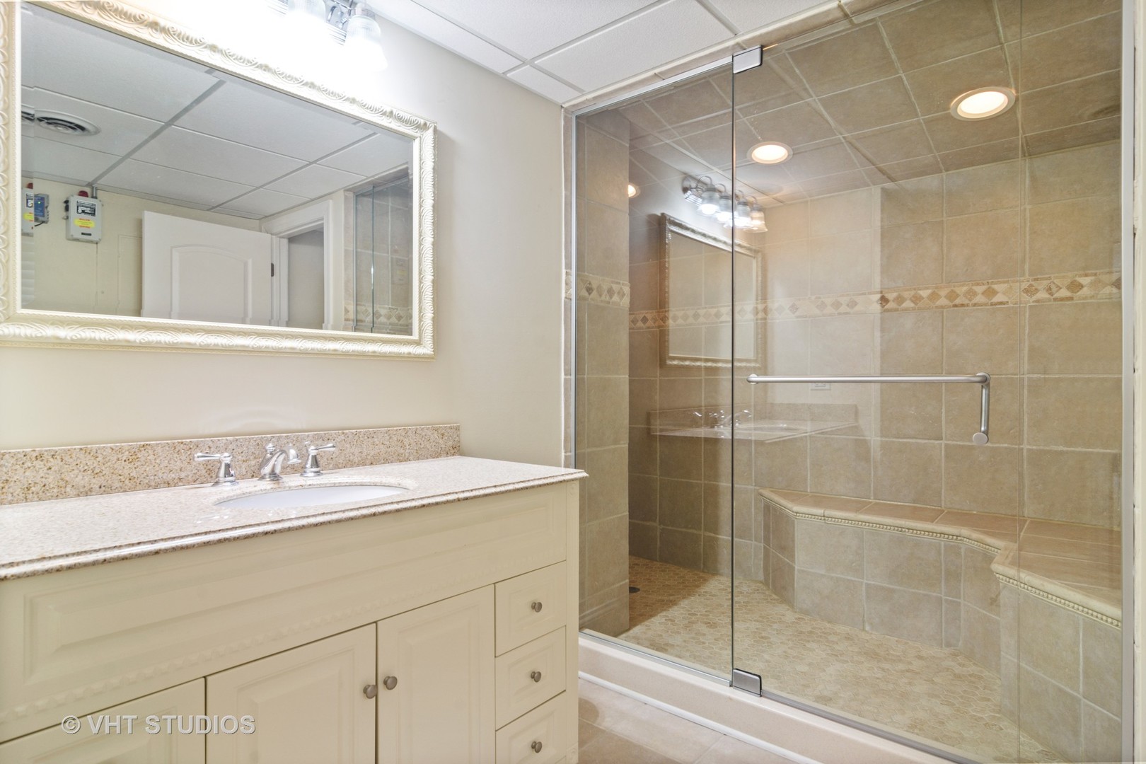 1885 West Durham Drive Inverness, IL 60067 - Photo 16 of 28 a bathroom with a shower sink and mirror