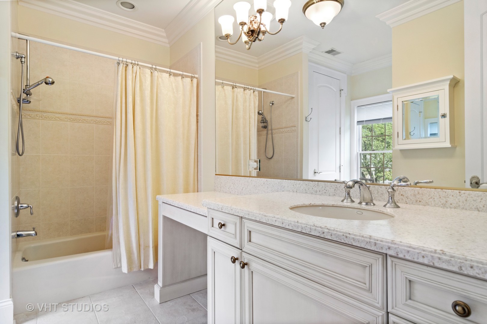 1885 West Durham Drive Inverness, IL 60067 - Photo 19 of 28 a bathroom with a granite countertop sink a mirror a shower and a bathtub