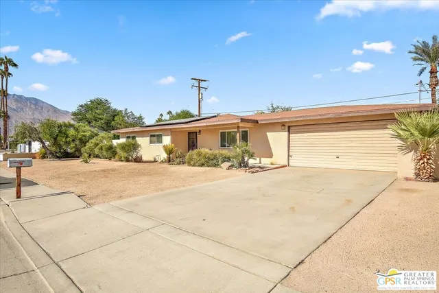 a front view of a building with basket ball court