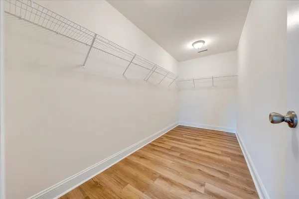 a view of a room with racks on the wall