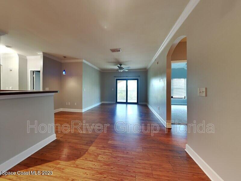 6450 Borasco Drive, Unit 3703 Melbourne, FL 32940 - Photo 5 of 13 a view of gallery with wooden floor