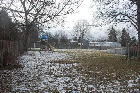 1135 Reid Road Flint, MI 48507 - Photo 6 of 17 20325291-5.JPG