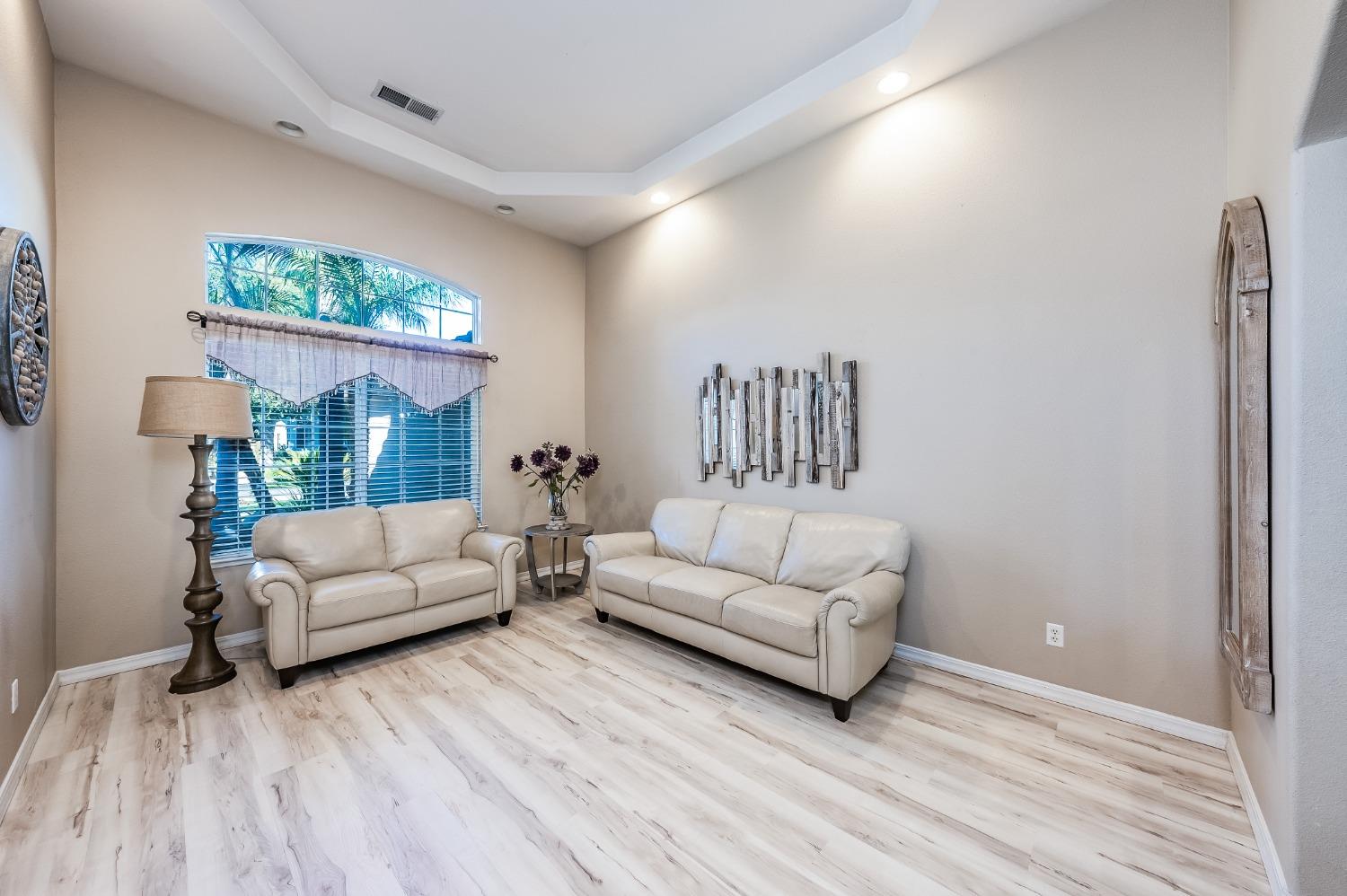 915 Trabon Way Madera, CA 93637 - Photo 6 of 33 a living room with furniture and a large window