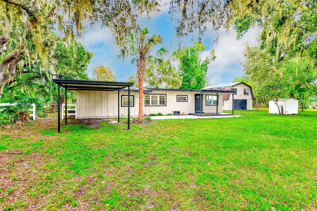 a house view with a garden space