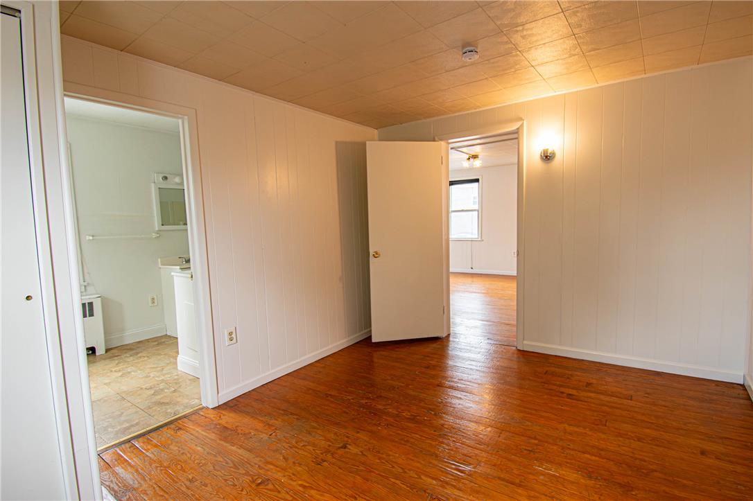 27 West Allen Street Allentown, PA 18102 - Photo 16 of 26 Refinished hardwood flooring flows throughout this adaptable, well-lit interior space.