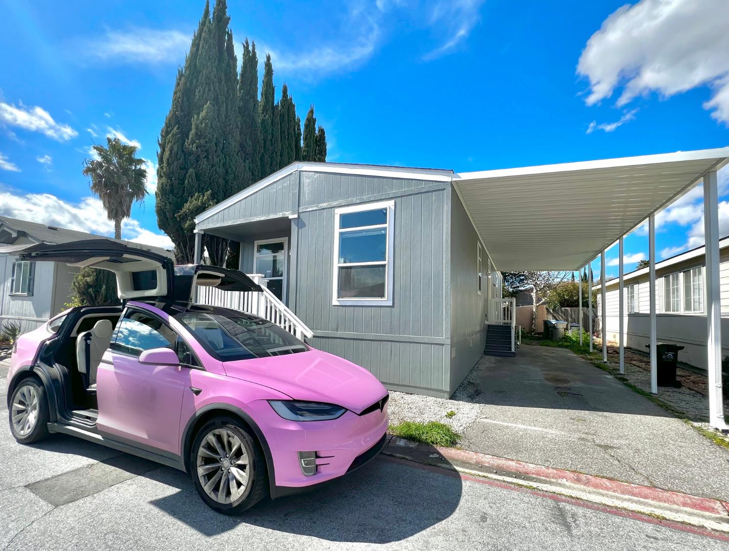 a front view of a house with parking