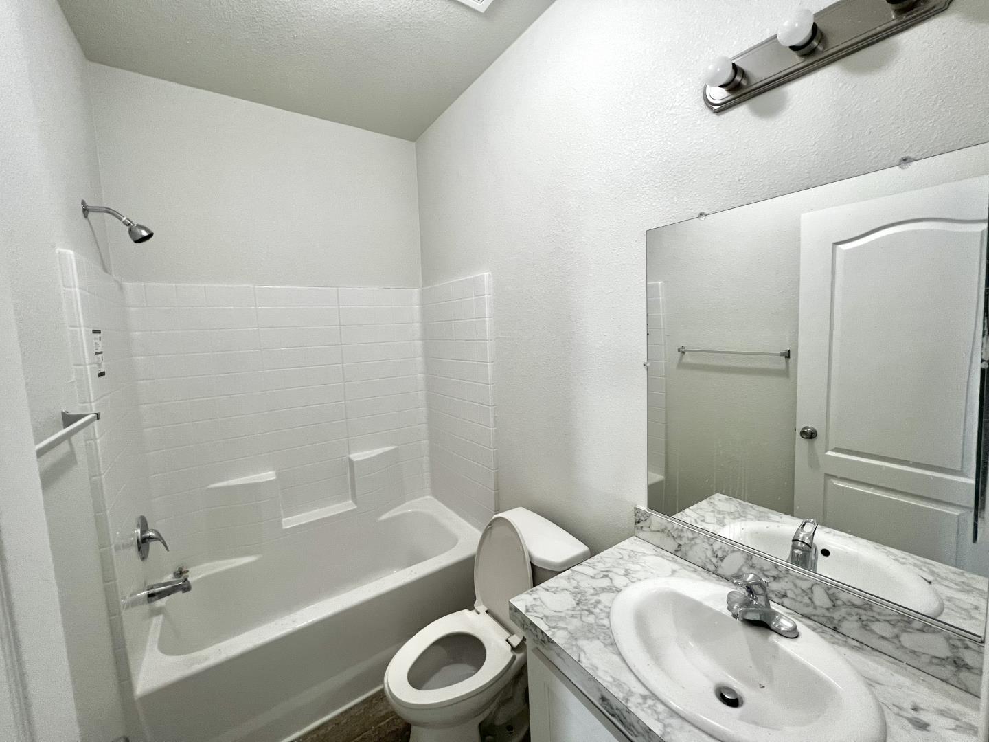 200 Ford Road, Unit 2 San Jose, CA 95138 - Photo 5 of 7 a bathroom with a sink a toilet and shower
