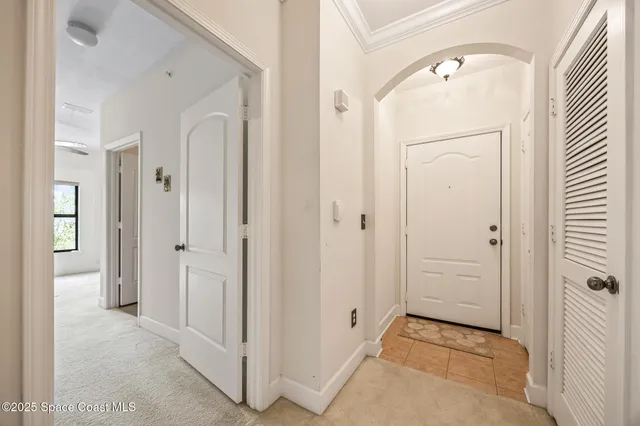wooden floor with white cabinets