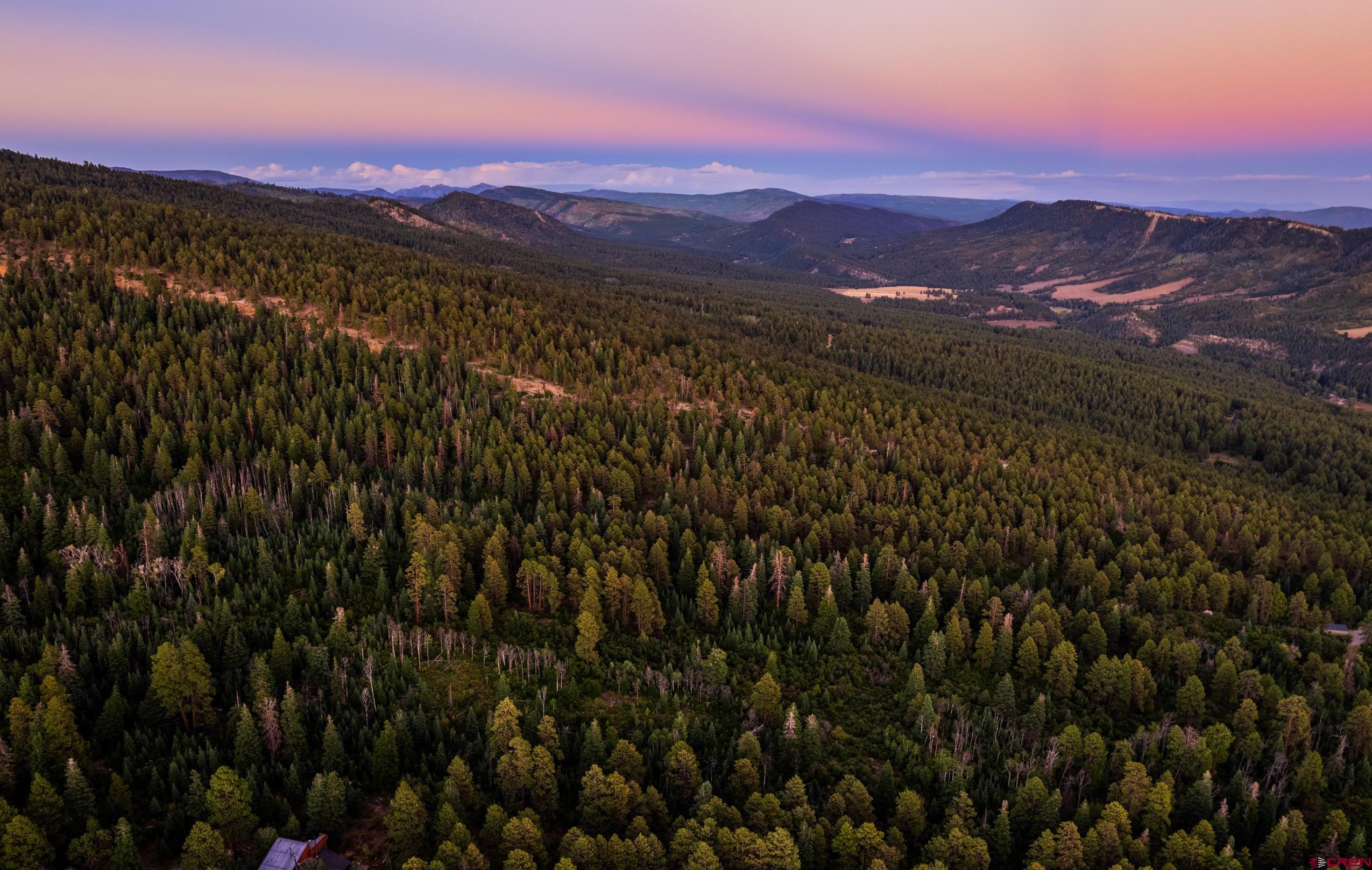 Lot 15 Taylor Ranch Road Durango, CO 81301 - Photo 35 of 35 a view of a city with mountains in the background