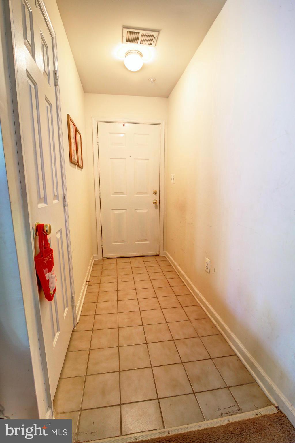 635 Constellation Square Southeast, Unit K Leesburg, VA 20175 - Photo 2 of 14 a view of a hallway