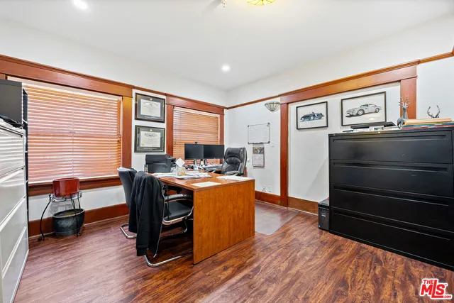 a kitchen with stainless steel appliances granite countertop a stove and a refrigerator