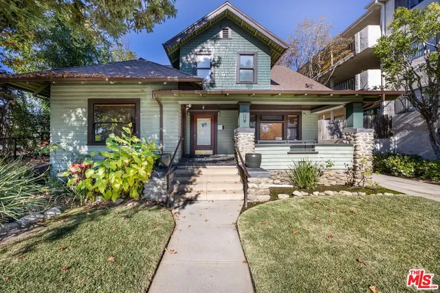 a front view of a house with a porch