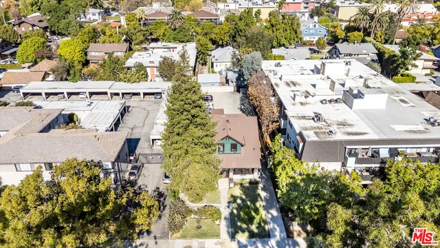 an aerial view of residential house with outdoor space