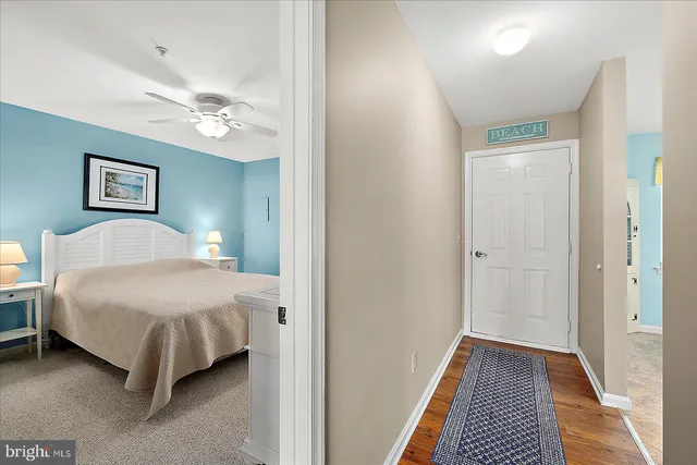 a bedroom with a bed and a walk in closet