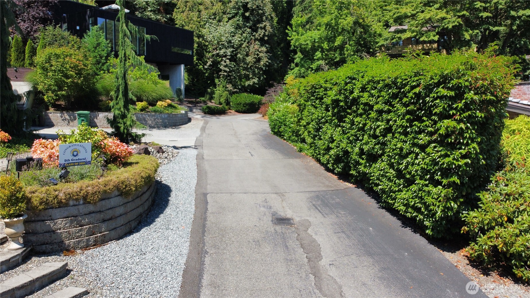 7421 East Mercer Way Mercer Island, WA 98040 - Photo 8 of 15 a view of a garden with patio