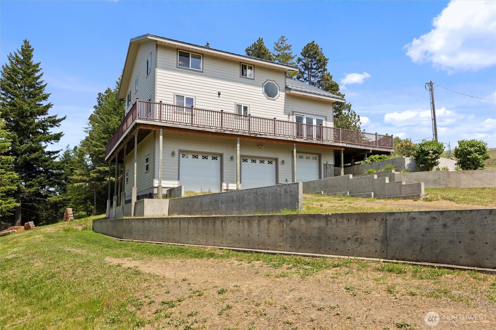 6379 Lewis Peak Road Waitsburg, WA 99361 - Photo 2 of 40 a view of a house with a swimming pool