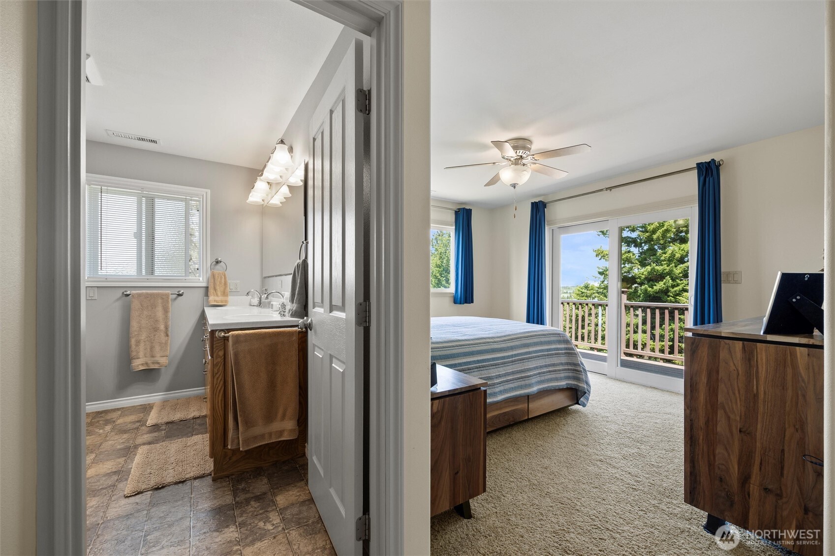 6379 Lewis Peak Road Waitsburg, WA 99361 - Photo 22 of 40 a bedroom with furniture and a chandelier