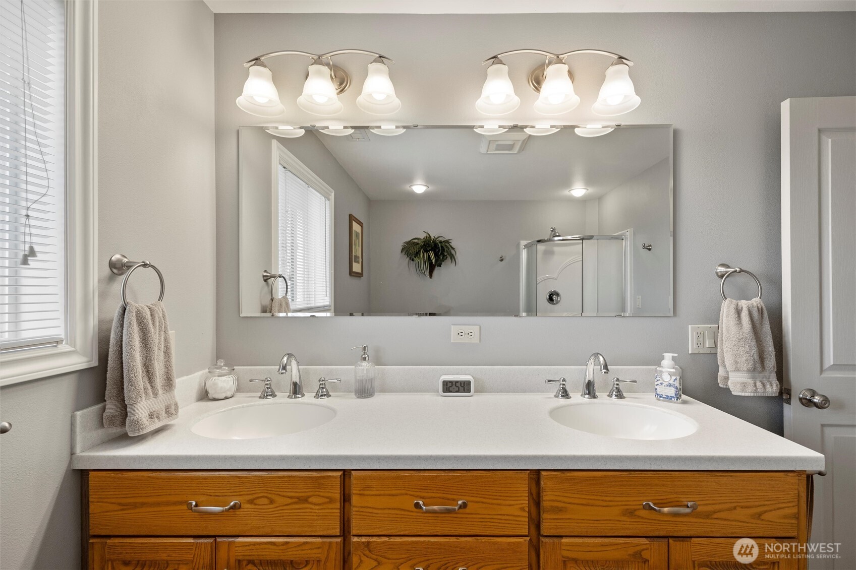 6379 Lewis Peak Road Waitsburg, WA 99361 - Photo 26 of 40 a bathroom with a sink double vanity and a mirror