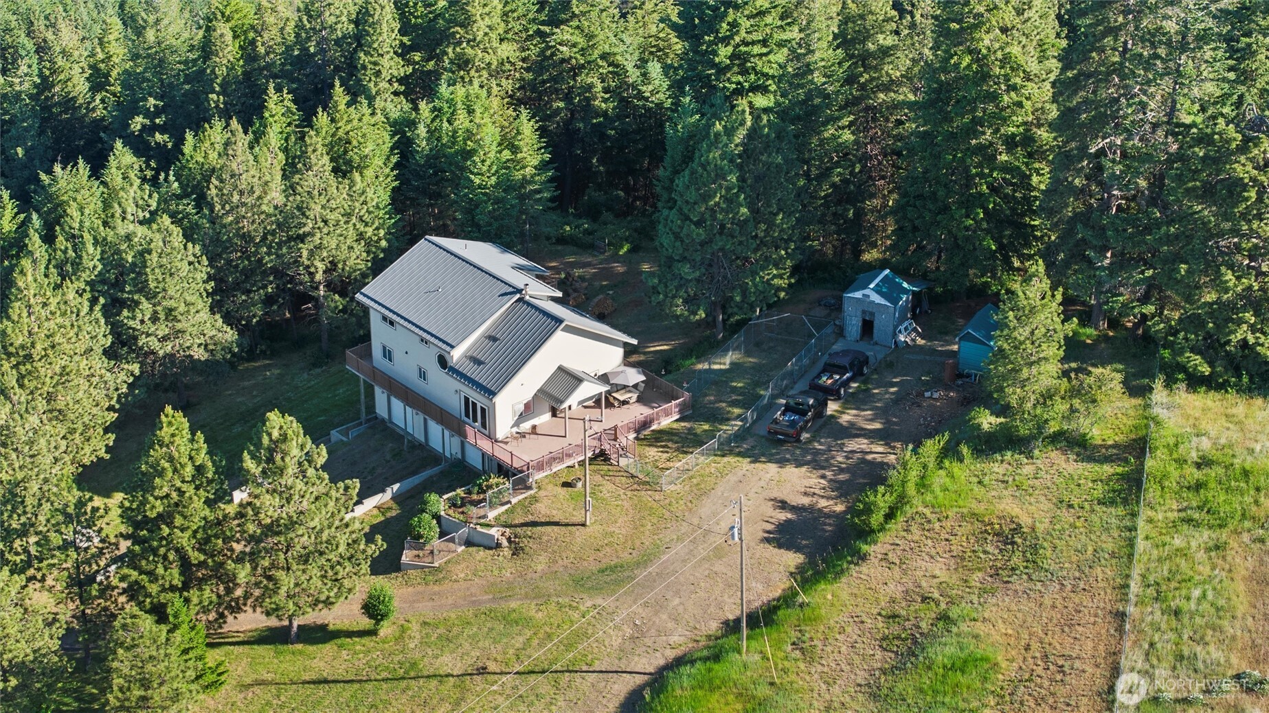 6379 Lewis Peak Road Waitsburg, WA 99361 - Photo 3 of 40 an aerial view of a house with a yard