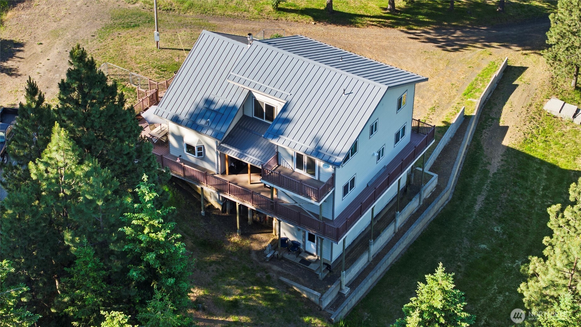 6379 Lewis Peak Road Waitsburg, WA 99361 - Photo 35 of 40 a view of a house with a yard