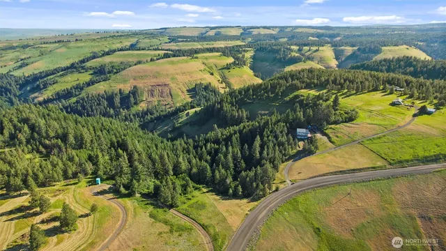 a view of a lake in middle of the town