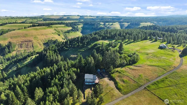 a view of a lake with a yard