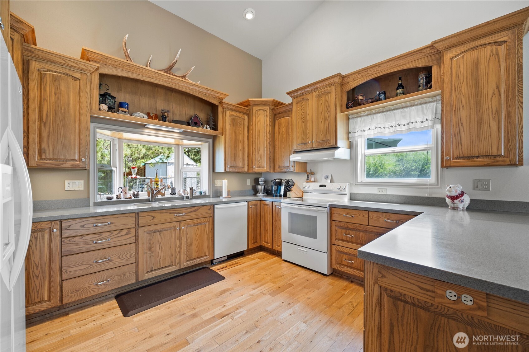 6379 Lewis Peak Road Waitsburg, WA 99361 - Photo 6 of 40 a kitchen with a sink stove and microwave