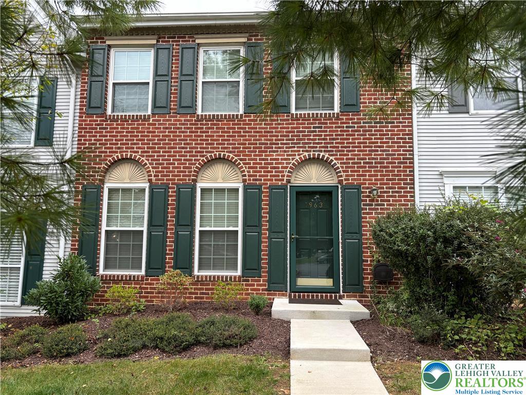 1963 Delancey Street Hellertown, PA 18055 - Photo 1 of 26 a house view with a garden space