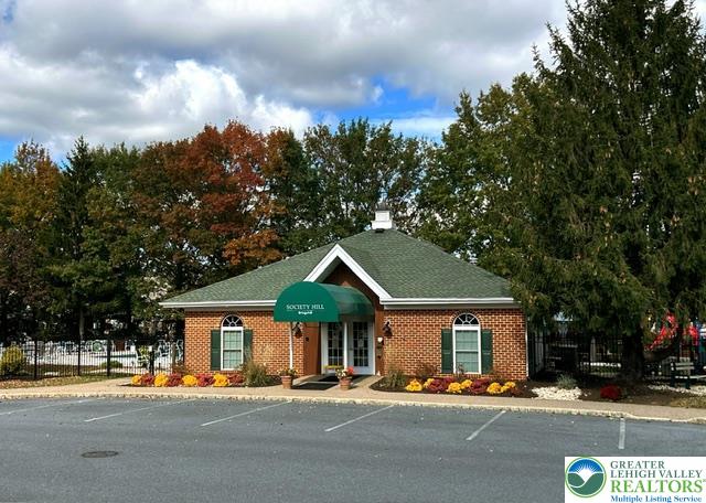1963 Delancey Street Hellertown, PA 18055 - Photo 16 of 26 a front view of a house with a porch