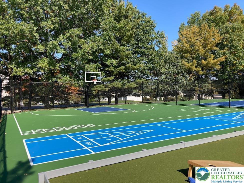 1963 Delancey Street Hellertown, PA 18055 - Photo 22 of 26 a view of a tennis ground with large trees