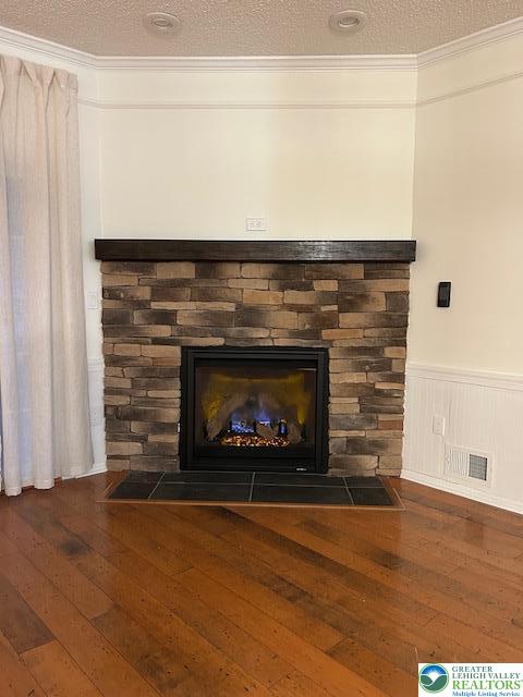 1963 Delancey Street Hellertown, PA 18055 - Photo 6 of 26 a fireplace with a clock on wooden floor