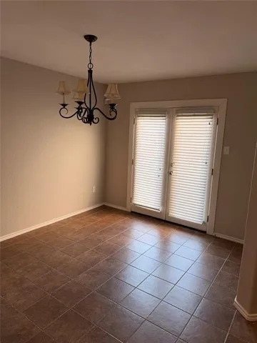 a view of a room with window and stairs