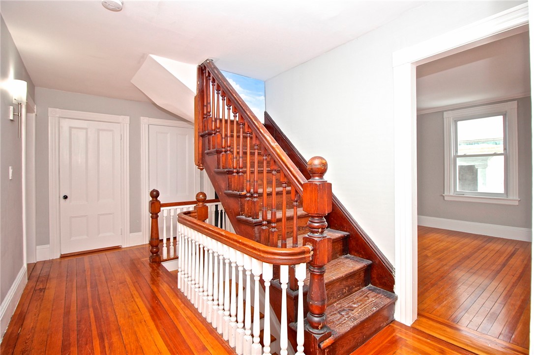 22 Annandale Road, Unit 2 Newport, RI 02840 - Photo 25 of 46 Center hall view to Living room and bath.
