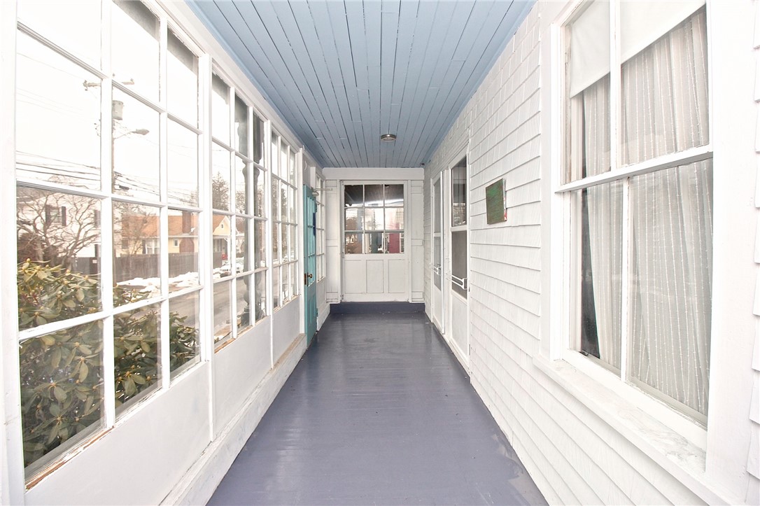 Front porch view from seating to front door