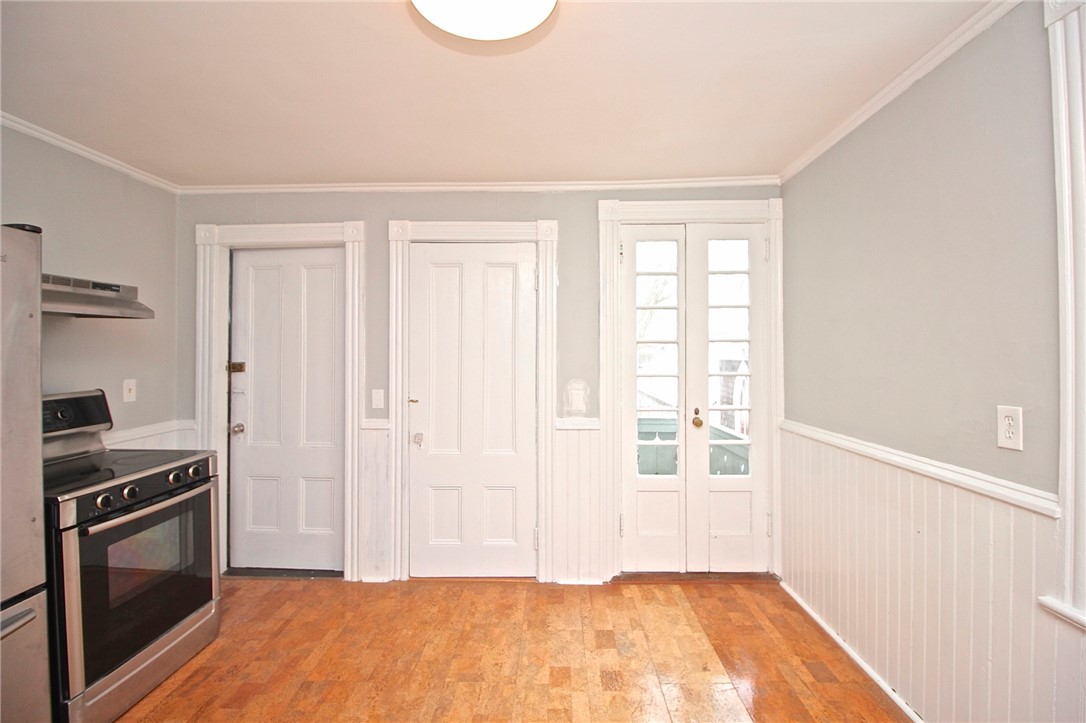 22 Annandale Road, Unit 2 Newport, RI 02840 - Photo 33 of 46 Eat in kitchen view to back door and balcony