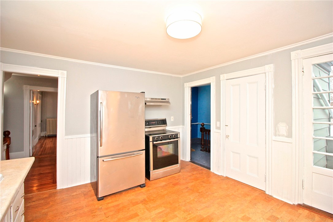 22 Annandale Road, Unit 2 Newport, RI 02840 - Photo 39 of 46 Kitchen view to hallway, bedroom 1 and back door to stairway/parking lot