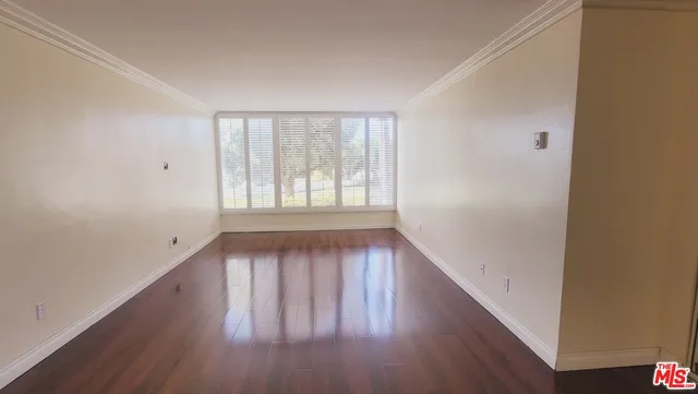 a view of a pathway of a house with a yard