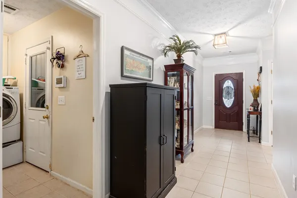a view of hallway with washer and dryer