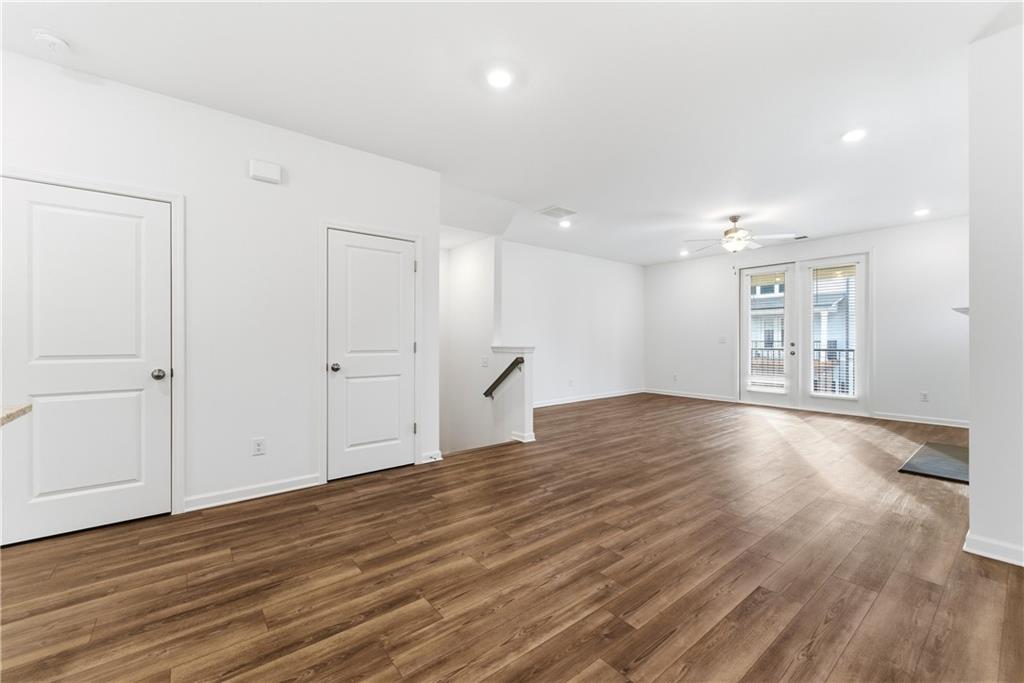 1621 Avery Way Tucker, GA 30084 - Photo 13 of 29 a view of empty room with wooden floor