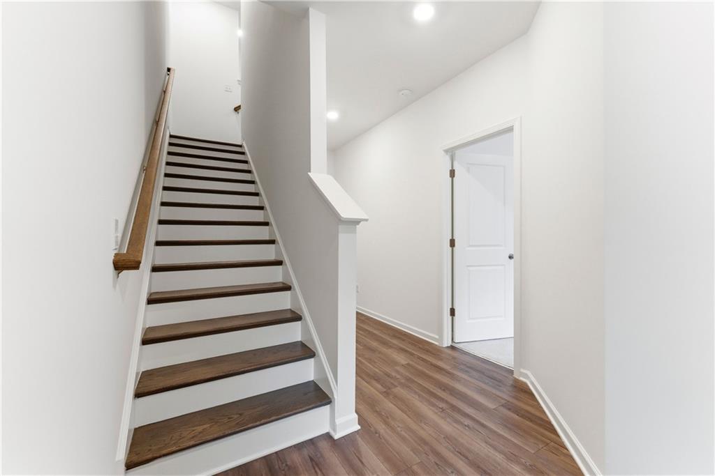 1621 Avery Way Tucker, GA 30084 - Photo 2 of 29 a view of a hallway with wooden floor and entryway