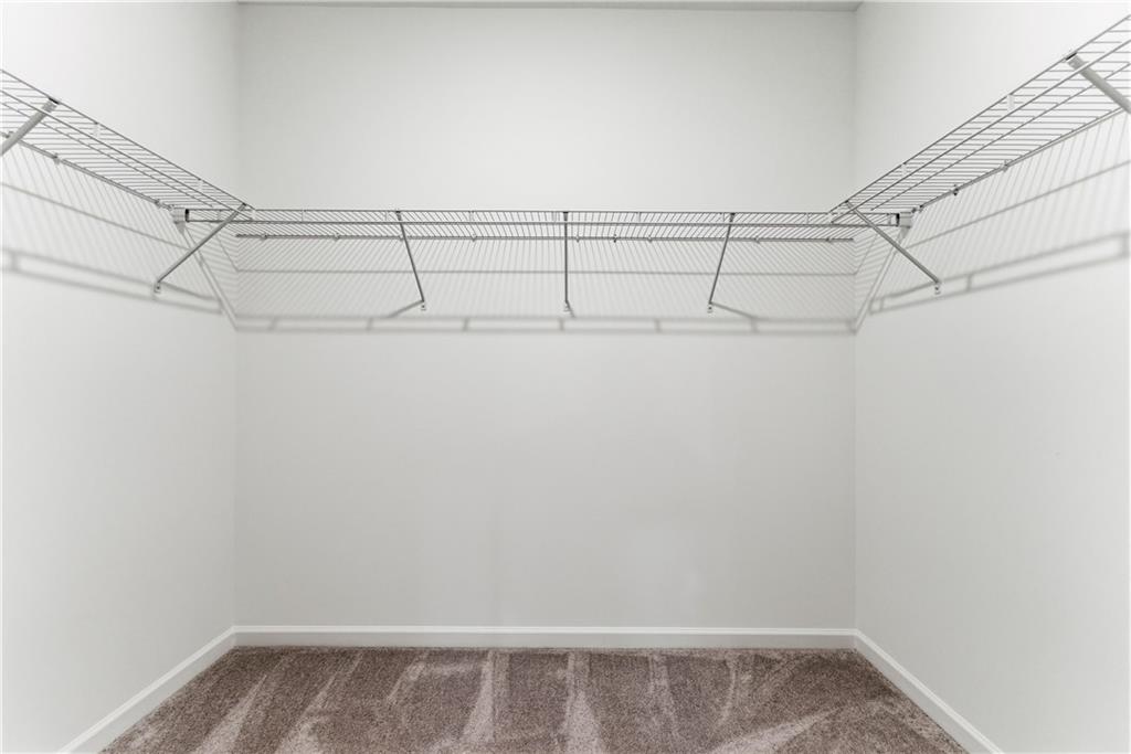 1621 Avery Way Tucker, GA 30084 - Photo 27 of 29 a view of a room with racks on the wall