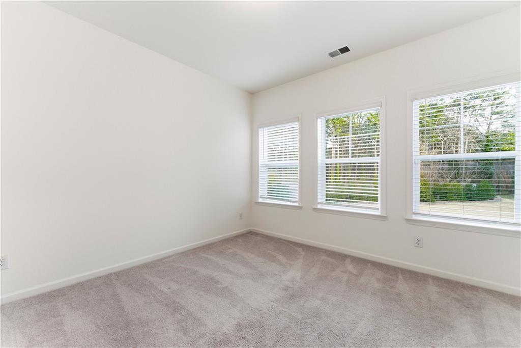 1621 Avery Way Tucker, GA 30084 - Photo 3 of 29 an empty room with a window