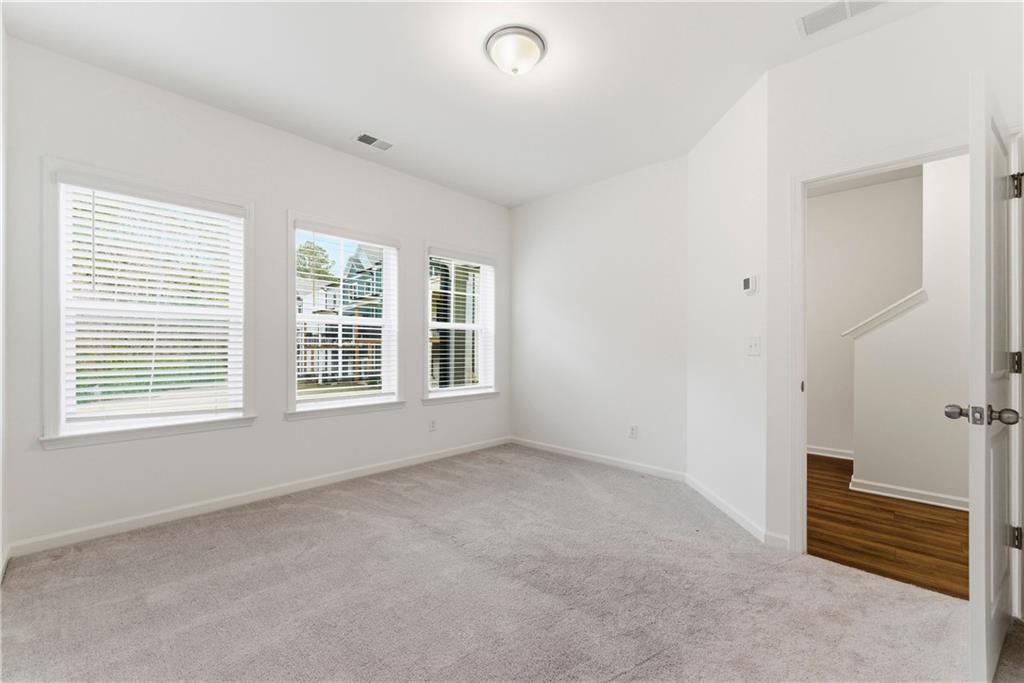 1621 Avery Way Tucker, GA 30084 - Photo 4 of 29 a view of an empty room with a window