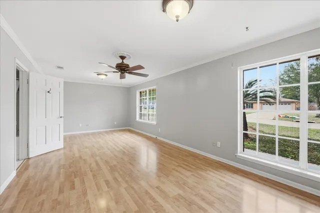 a view of an empty room with a window